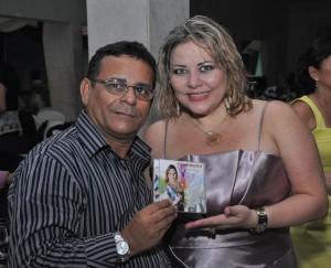 O fotógrafo Claudemir Mota e a cantora Cristiane Velassy