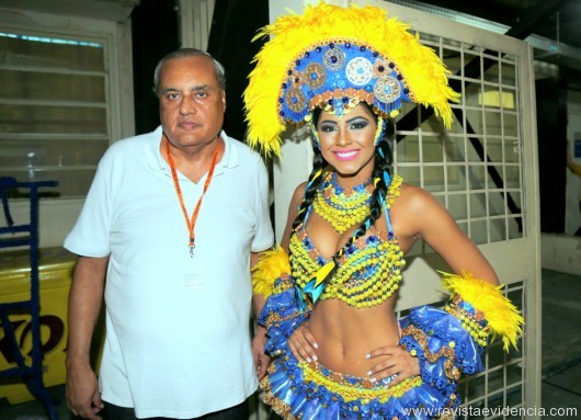 Da Liga Independente das Escolas de Samba do Rio de Janeiro (LIESA), o jornalista Paulo Faustino com a Rainha do Folclore dos Caprichosos Brena Dianná.